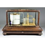 An Oak Cased Barograph, by Short & Mason of London, No. 5545, complete with chart drawer, on