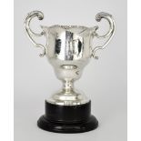 A George V Silver Two-Handled Prize Cup, by Wakely & Wheeler, London 1911, the shaped rim with