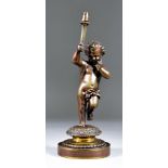 A Patinated Bronze and Gilt Metal Electric Table Lamp, in the form of a putto holding a flaming