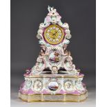 A 19th Century Continental Porcelain Cased Mantel Timepiece in the Rococo Manner, the 3.5ins gilt