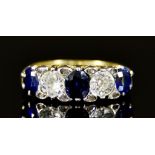 An 18ct Gold Sapphire and Diamond Five Stone Ring, 20th Century, set with two brilliant cut white