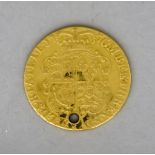 A George III Guinea, 1776 (holed), fair