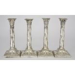 A Matched Set of Four Late Victorian Silver Candlesticks, two by Thomas Bradbury & Sons, London