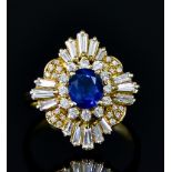 An 18ct Gold Sapphire and Diamond Cluster Ring, 20th Century, set with a centre sapphire stone