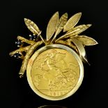 A Half Sovereign Brooch, 9ct gold mount of floral design set with small blue stones and a George V
