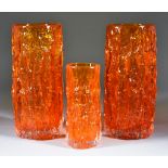 A Pair of Geoffrey Baxter for Whitefriars Glass 'Bark' Vases, each 9.25ins high, in tangerine,