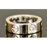 An 18ct White Gold Diamond Set Ring, Modern, by Cartier, set with three brilliant cut white