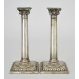 A Pair of Edward VII Silver Candlesticks, by William Hutton & Sons, Sheffield 1907, with bead