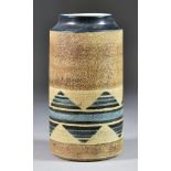 A Troika Pottery Cylinder Vase, circa 1970s, textured ground with zigzag design in blues and browns,