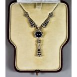 A Platinum Diamond and Sapphire Necklace, 20th Century, retailed by Asprey & Co., set with a