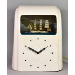 A Vitascope Industries Ltd Electric Ship Diorama Clock, the cream bakelite stepped case of Art