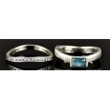 Two Platinum Rings, Modern, both designed to fit against each other, one set with small diamonds,