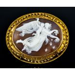 A Gilt Metal Carved Cameo Brooch, 20th Century, depicting an angel and infant, 60mm x 50mm, total