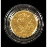 A Queen Elizabeth II Long Tail Sovereign, 2007, in Royal Mint wood effect presentation case with