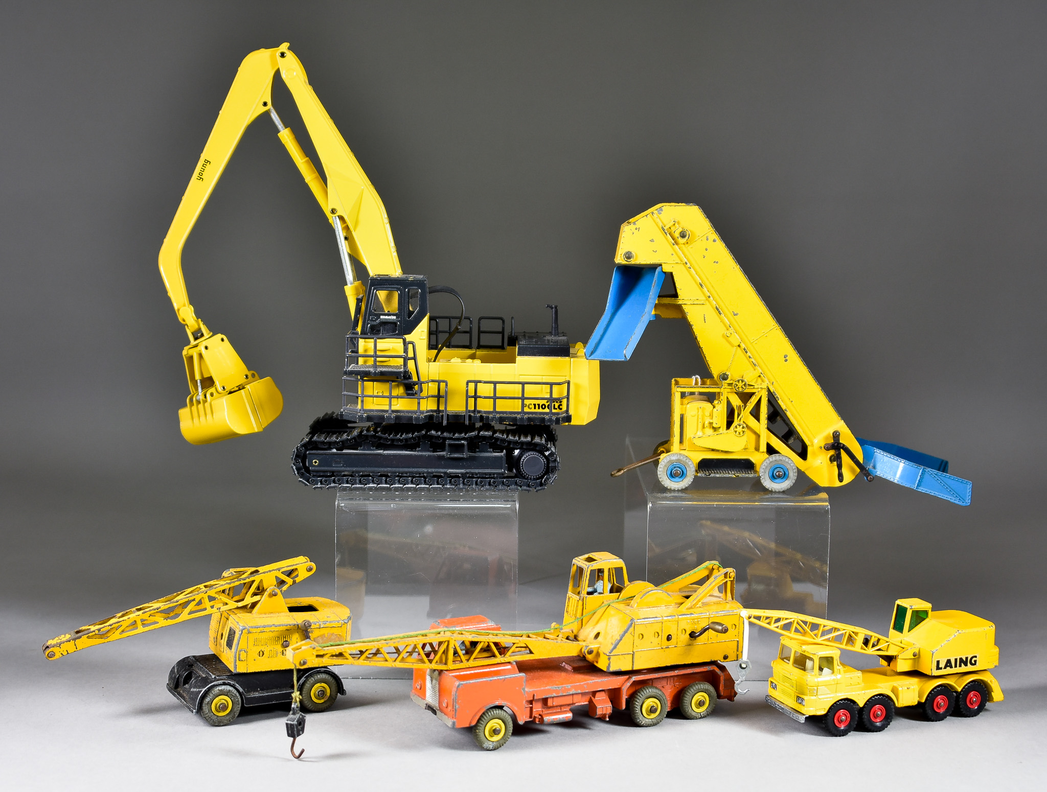 A Collection of Construction Toys, comprising - Seven Dinky 20 Ton Lorry Mounted Cranes, No. 972,