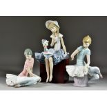 A Lladro Porcelain Figure No. 1378 - 'Suzy and her Doll', 11.5ins high, and six others, all in