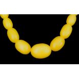 A Graduated String of Butterscotch Amber Beads, 720mm overall, gross weight 68.5g