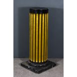 A Black and Gilt Painted Fluted Circular Pedestal, on square base, 40ins high