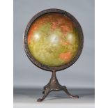 An 18ins Terrestrial Excelsior Globe, by J. L. Hammett, on cast oxidised metal tripod stand with paw