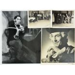 Peter Cushing Photographs - a selection of sixteen black and white photographs of Peter Cushing in