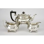 A George VI Silver Oval Three-Piece Tea Service, by Elkington and Co. Birmingham 1944 and 1945, with