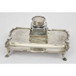 A Late Victorian Silver Rectangular Ink Stand, by Goldsmiths & Silversmiths Co. London 1899, of