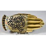 A Rare Volupte Hand Compact "Gay Nineties Mitt", gold and black with multi coloured bracelet, with