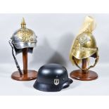 Three Re-Enactor Grade Reproduction Helmets, one World War I Pickelhaube, one Dragoons, and one