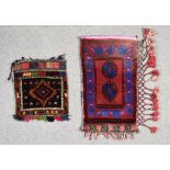 A 20th Century Turkmen Juval, woven in colours of ivory, navy blue and wine, two octagonal guls on a