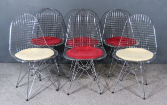 After Ray and Charles Eames - a set of six chromed metal "Wire Mesh" chairs, with circular vinyl pad