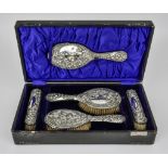 An Edward VII Silver Backed Five-Piece Dressing Table Set, by Robert Gravenor, Chester 1905,