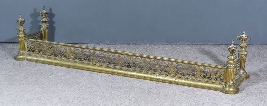 A 19th Century Brass Fender with pierced front and sides, fluted corners with two-handled urn