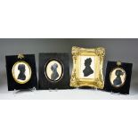 Four English Silhouettes, 19th Century - "Mrs Cock" wearing white bonnet and heightened in gilt, "