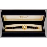 A Lady's Quartz Movement Wristwatch, by Chopard, Model Happy Diamonds, serial No. 981130, 18ct