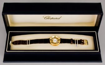 A Lady's Quartz Movement Wristwatch, by Chopard, Model Happy Diamonds, serial No. 981130, 18ct