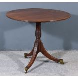 A George III Mahogany Circular Tripod Occasional Table, with reeded edge to top, on baluster