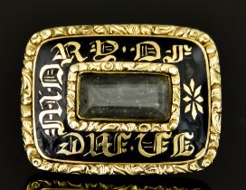 A George IV Enamel and Gold Mourning Brooch, dated 1828, yellow metal, inlaid with black enamel with