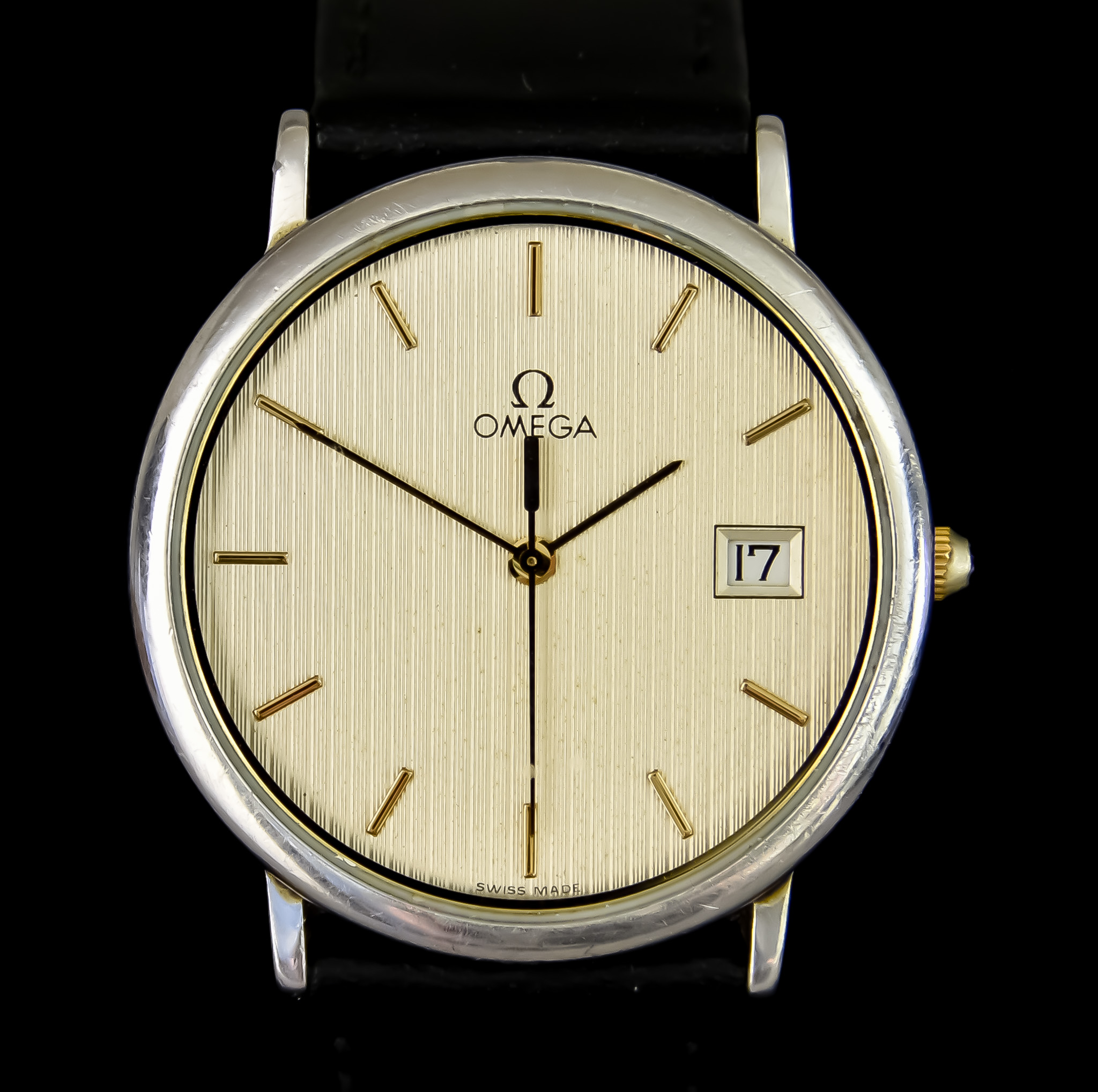 A Gentleman's Quartz Wristwatch by Omega, model De Ville, white metal case, 33mm diameter, champagne