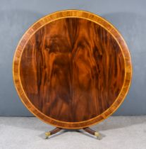 A George IV Mahogany, Rosewood Banded and Satinwood Strung Circular Breakfast Table, on central