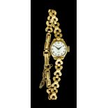 A Lady's 9ct Gold Cocktail Watch by Rotary, 9ct gold case, 17mm diameter, white enamel dial with