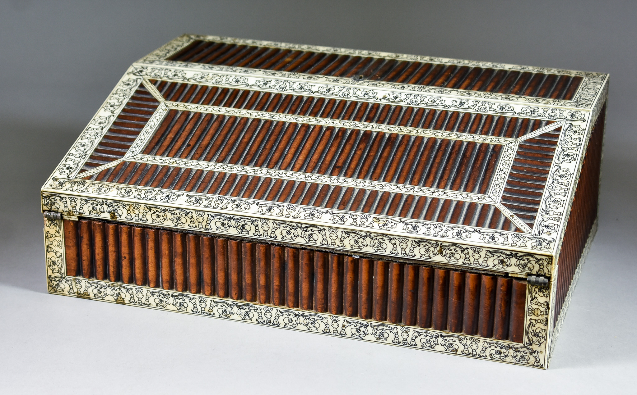 An Anglo-Indian Vizaghapatam Hardwood and Engraved Bone Writing Slope, the lifting top revealing