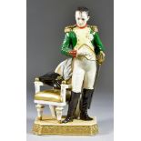 A Continental Porcelain Figure of the Emperor Napoleon Bonaparte, 20th Century, with impressed and