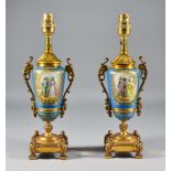 A Pair of Gilt-Metal Mounted Porcelain Two-Handled Urns, now converted to electric table lamps, each