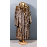 A Lady's Russian Wolf Full-Length Fur Coat, size 10, a mink short jacket, size 10 and four fur