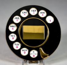 A Vintage Telephone Dial Powder Compact, 1950's, black enamel and gold tone, puff and sifter