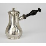 An 18th Century Dutch Sliver Chocolate Pot, of baluster form with reeded thumbpiece to domed lid,