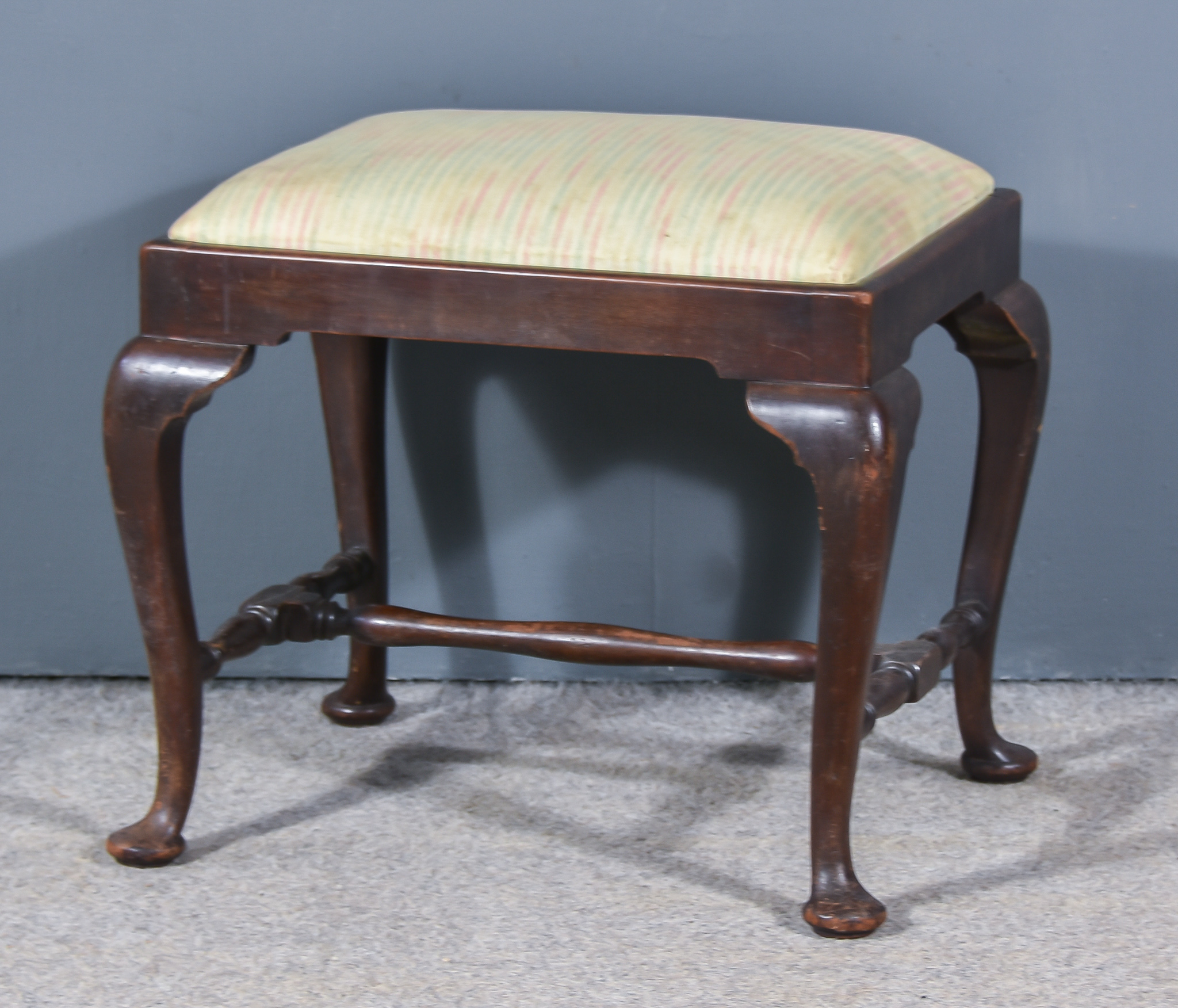A Mahogany Framed Rectangular Dressing Table Stool, of Georgian Design, with upholstered drop-in