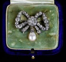 A Diamond and Pearl Brooch, Late 19th/ Early 20th Century, set with old European cut diamonds,