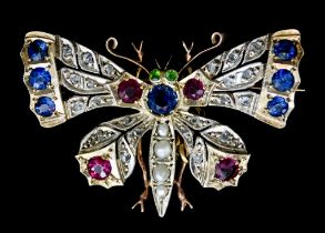 A 9ct Gold Gem Set Brooch, in the form of a butterfly, set with sapphires, rubies, emeralds,