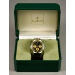 A Gentleman's Quartz Wristwatch, by Gucci, Serial No. 9400, stainless steel case, 38mm diameter,